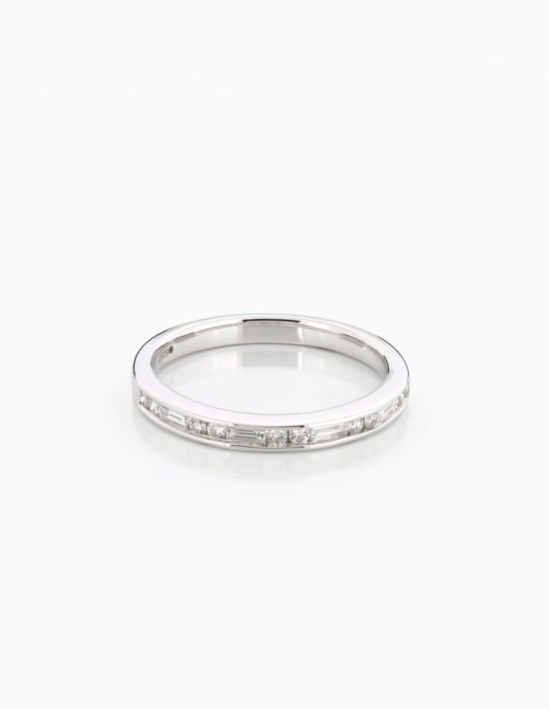 18ct white gold half-eternity ring channel-set with alternating baguette and round diamonds