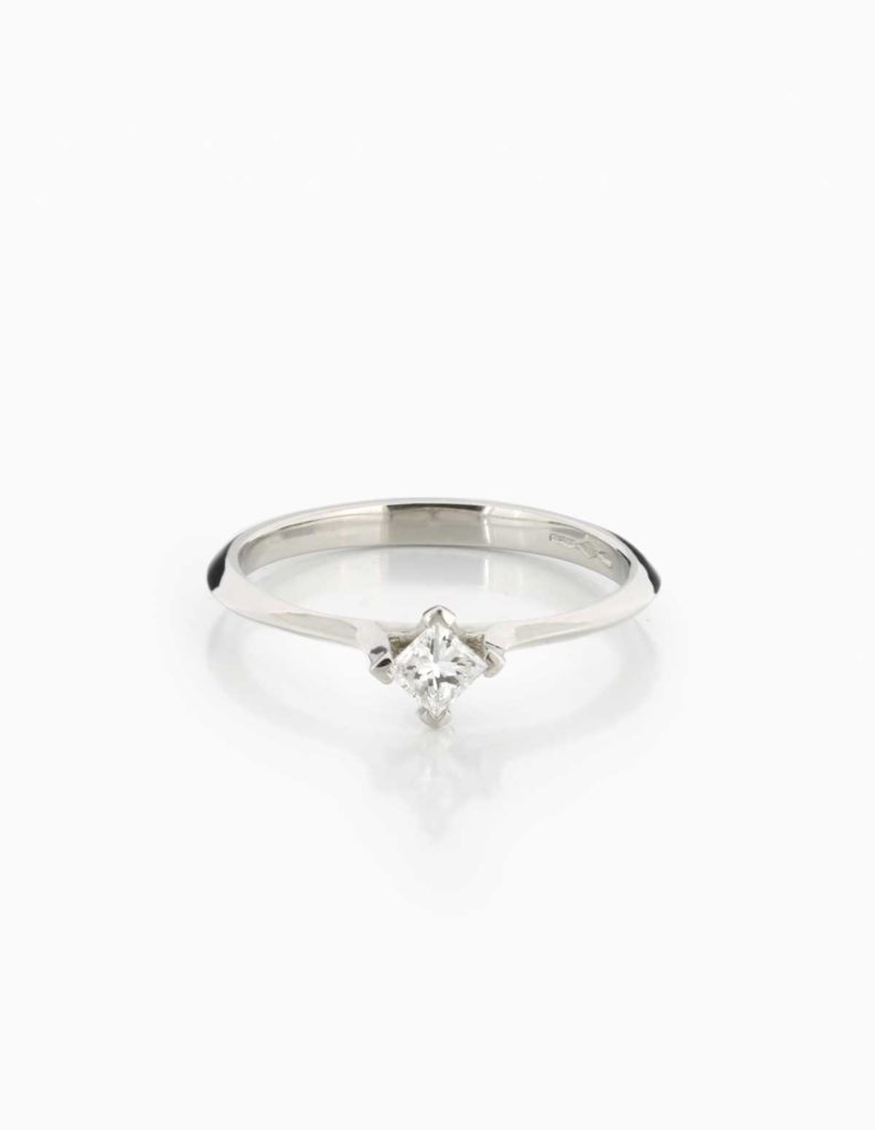 Platinum solitaire ring with a 4-claw set princess-cut diamond