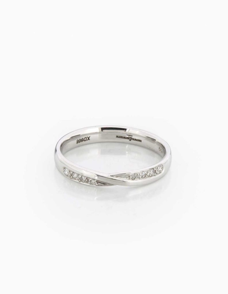 18ct white gold band ring with a crossover front set with diamonds