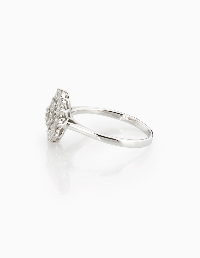 Side view of a diamond open cluster ring in white gold