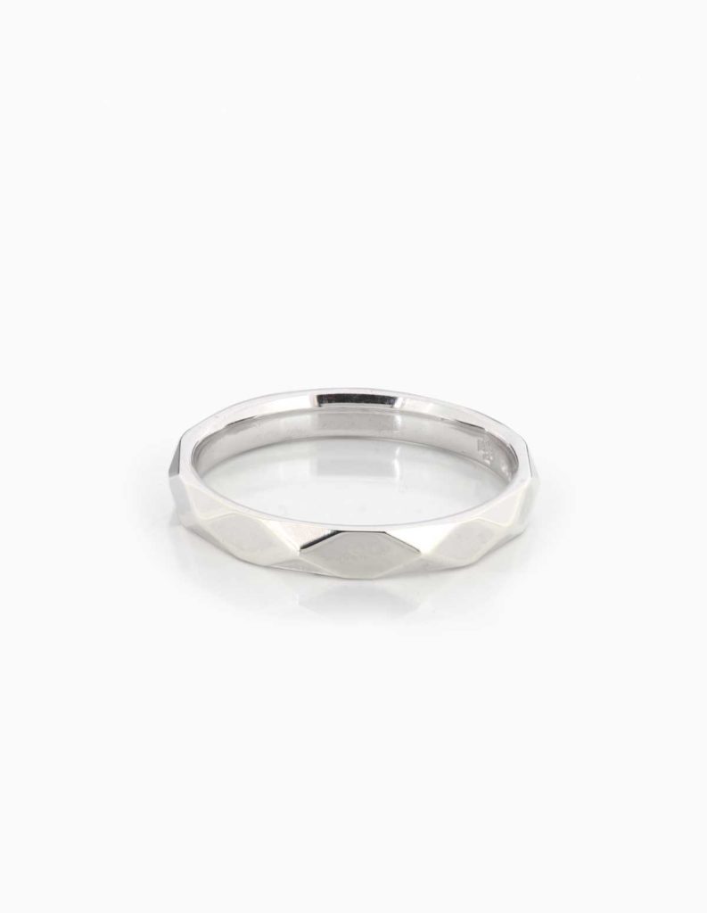 9ct white gold wedding band with a faceted diamond-cut pattern