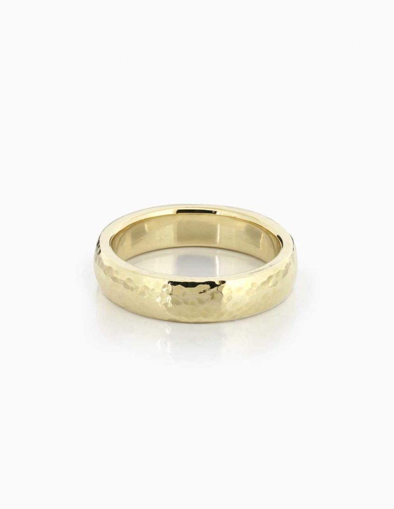 18ct yellow gold wedding band with a hammered texture finish
