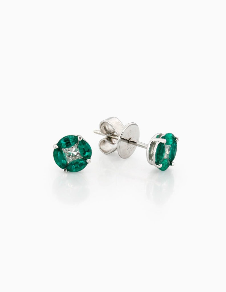 Pair of 18ct white gold stud earrings with princess-cut diamond centres framed by marquise emeralds, shown with the post and butterfly back