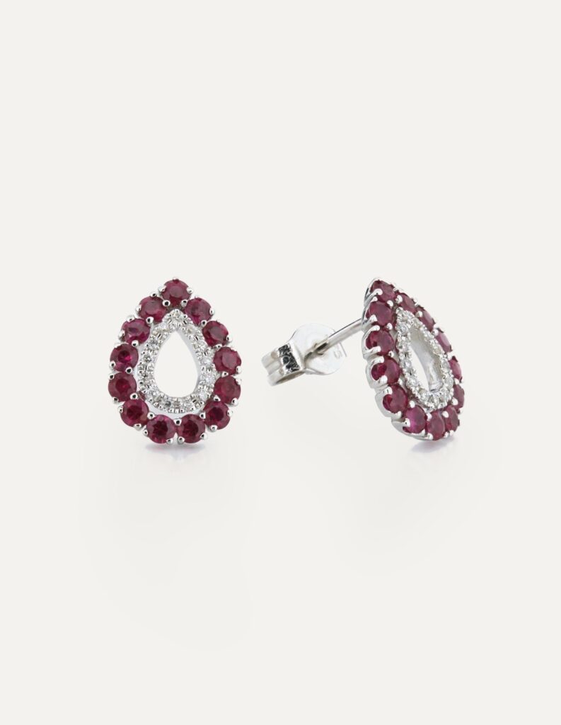 Pair of 9ct white gold pear-shaped stud earrings with a ruby cluster framed by a diamond halo, shown with the post and butterfly back