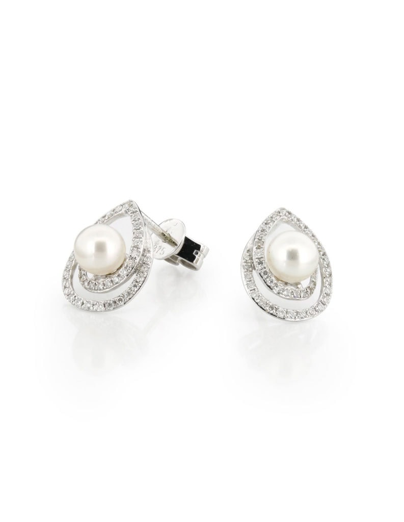 Pair of 9ct white gold stud earrings with a white pearl framed by a swirling diamond halo, shown with the post and butterfly back