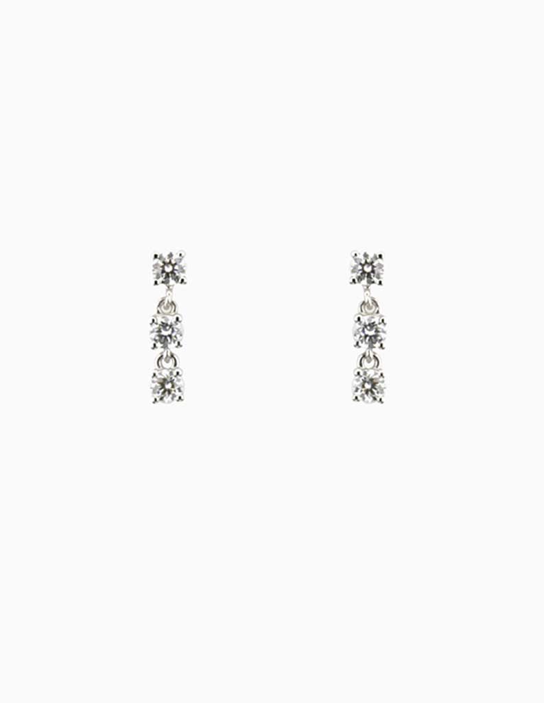 9ct white gold drop earrings with a vertical trio of round diamonds