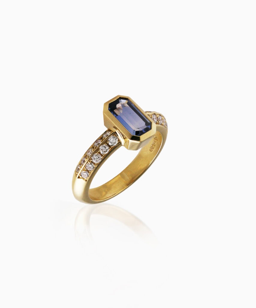 JCP Roma ring Light blue octagonal sapphire with double row diamonds on shoulders 0.39ct G VS 18ct yellow gold ring size L
