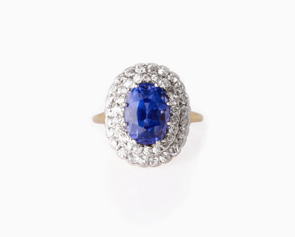 Dress ring oval colour change sapphire 4.29ct with double diamond halo 1.70ct 18ct yellow gold ring size J