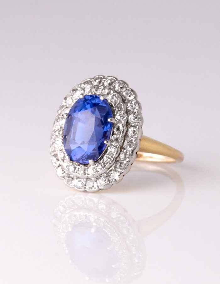 Dress ring oval colour change sapphire 4.29ct with double diamond halo 1.70ct 18ct yellow gold ring size J — side view