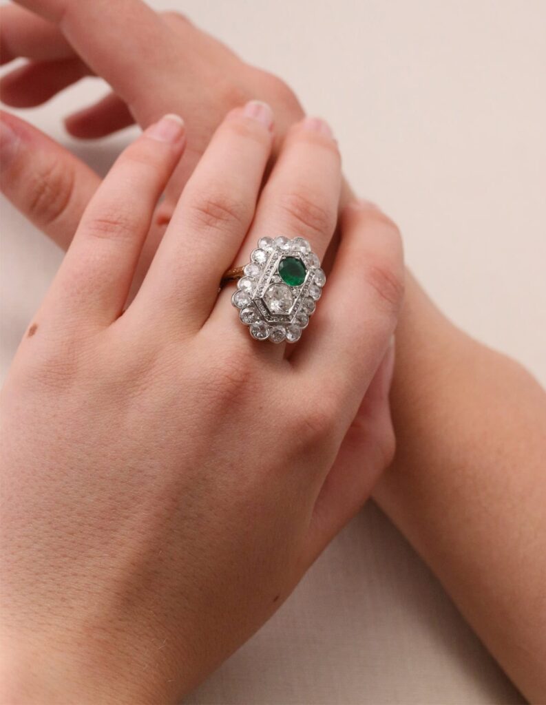 Sheild dress ring old european cut natural dia 0.90ct, 1 round mixed cut natural Emerald 0.90ct, 58 rose and old mine cut natural diamond halo 3.00cts, 7.65g, S12 clarity 18ct white and yellow gold ring size J1/2