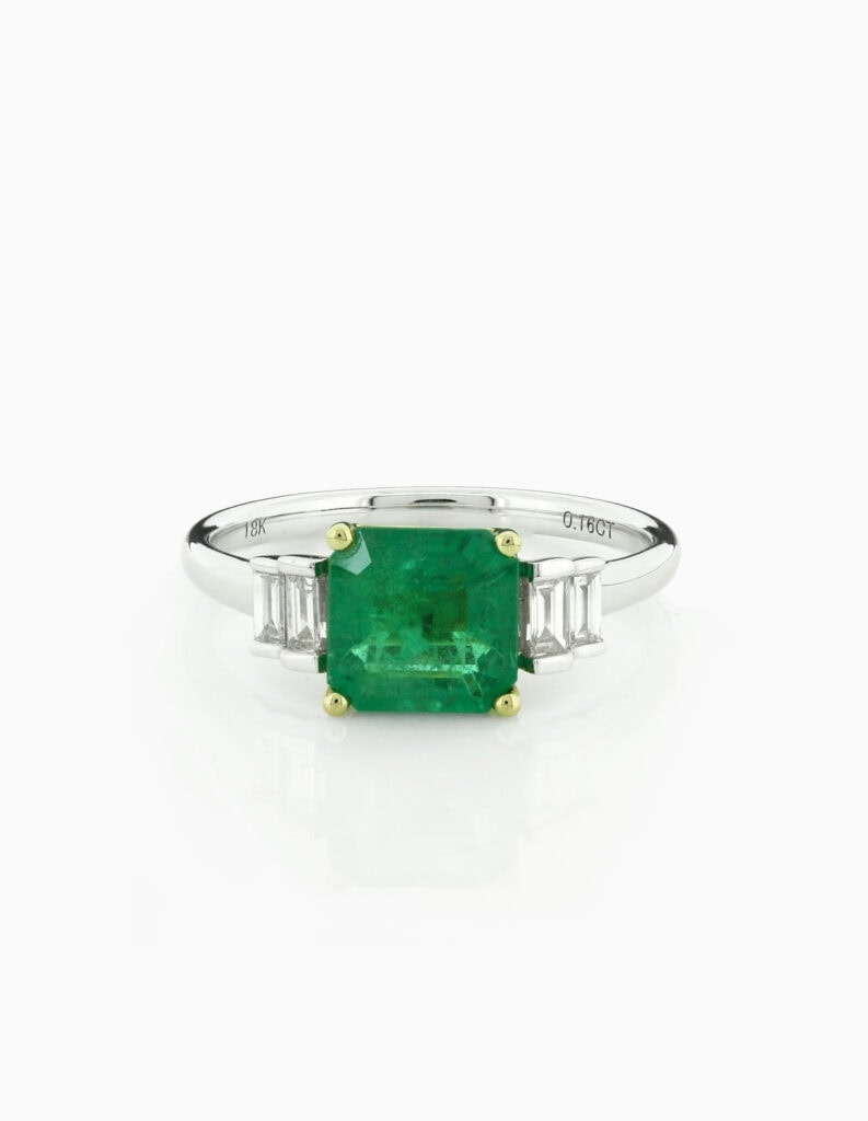 Dress ring cushion emerald 1.55ct with baguette diamond shoulders 0.16ct 18ct white gold ring size M