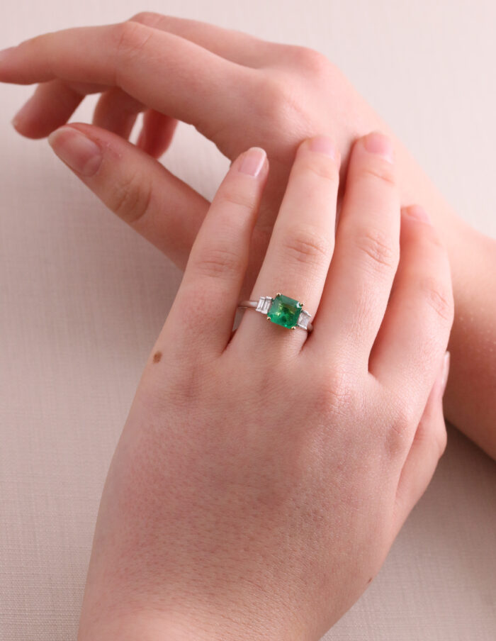 Dress ring cushion emerald 1.55ct with baguette diamond shoulders 0.16ct 18ct white gold ring size M