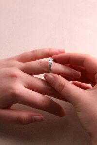 Trilogy ring claw set princess cut centre 0.30ct F VS1 cert GIA1395167220 diamond set shoulders 0.5ct total platinum ring size L