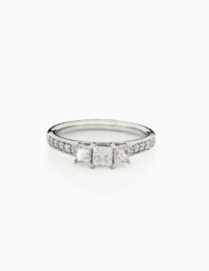Trilogy ring claw set princess cut centre 0.30ct F VS1 cert GIA1395167220 diamond set shoulders 0.5ct total platinum ring size L
