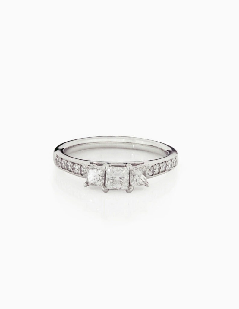 Trilogy ring claw set princess cut centre 0.30ct F VS1 cert GIA1395167220 diamond set shoulders 0.5ct total platinum ring size L