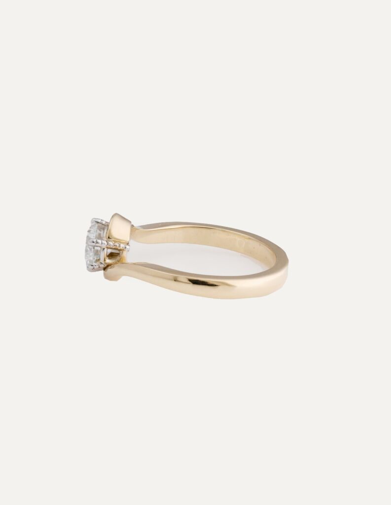 JCP Solitaire ring 6 claw round diamond 0.54ct swept shoulders 18ct yellow gold ring size I 1/2 — side view