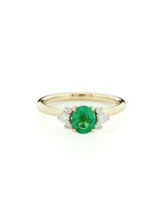Dress ring oval centre emerald 0.70ct with diamond side stones 0.17ct GSI 18ct yellow gold ring size M