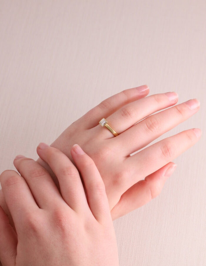 JCP Solitaire rubover princess cut diamond 0.57ct G/VS2 18ct yellow gold ring size M GIA certificate no 6177031331