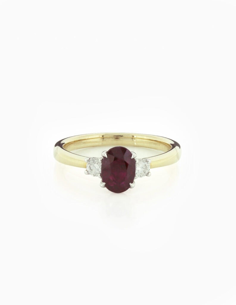 Three stone ring oval dark ruby 1.00ct and diamond 0.20ct GSI 18ct white gold ring size M