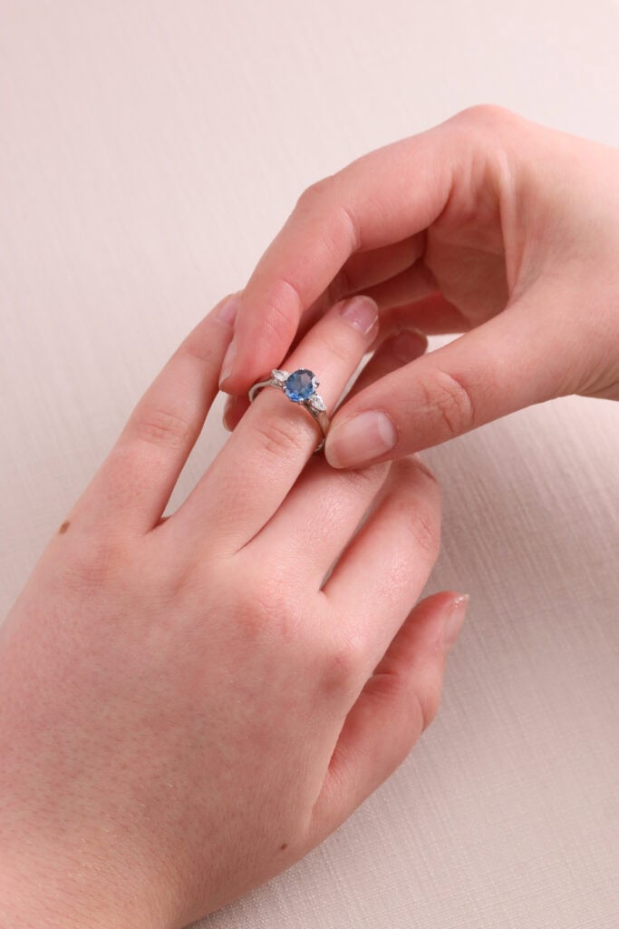 Three stone ting oval Sapphire 1.25ct and pear shape diamonds Platinum ring size N 1/2