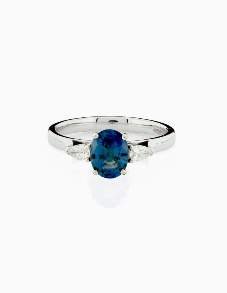 Three stone ting oval Sapphire 1.25ct and pear shape diamonds Platinum ring size N 1/2
