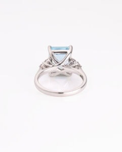JCP Dress ring rectangular Aquamarine 4.38ct with trefoil diamond shoulders 0.27ct Platinum ring size M — back view