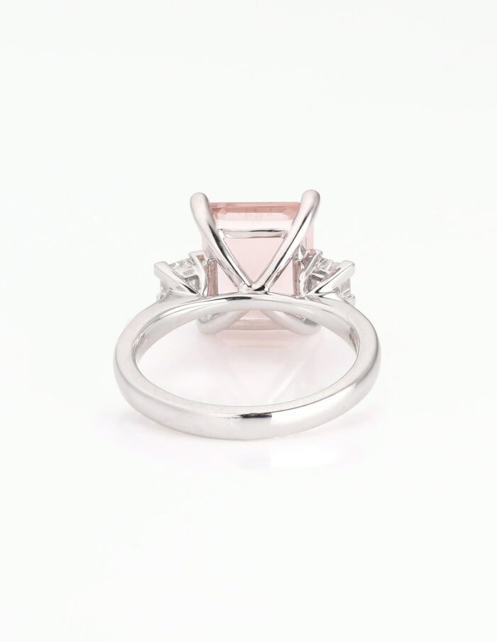 Dress ring octagonal Morganite 3.84ct 4 claw with princess diamonds on shoulders 0.50ct 18ct white gold ring size M — back view