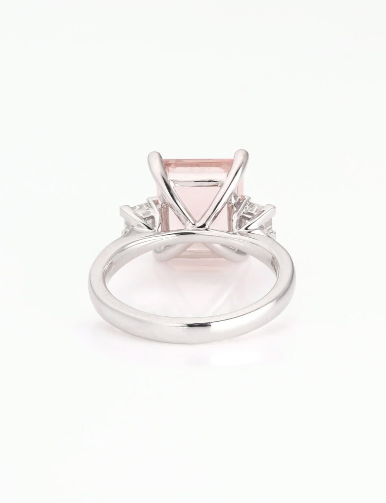 Dress ring octagonal Morganite 3.84ct 4 claw with princess diamonds on shoulders 0.50ct 18ct white gold ring size M — back view