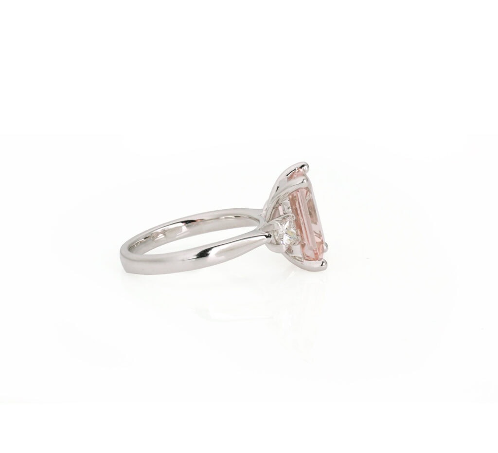 Dress ring octagonal Morganite 3.84ct 4 claw with princess diamonds on shoulders 0.50ct 18ct white gold ring size M — side view
