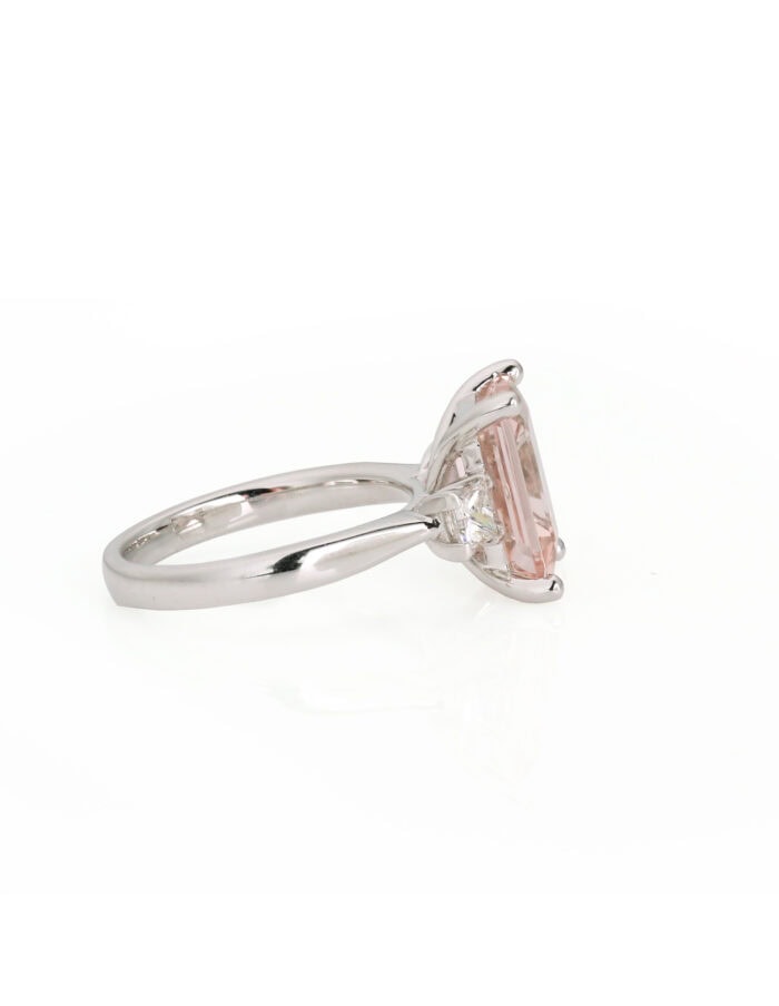 Dress ring octagonal Morganite 3.84ct 4 claw with princess diamonds on shoulders 0.50ct 18ct white gold ring size M — side view