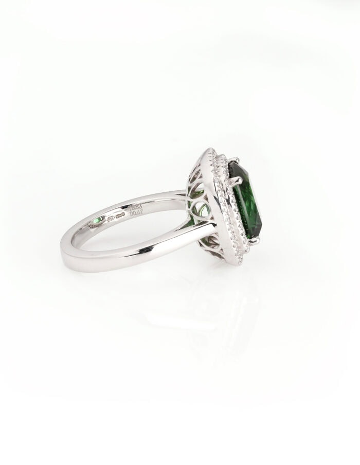 Dress ring green Tourmaline 5.83ct with double halo of round diamonds 0.47ct platinum ring size N — side view
