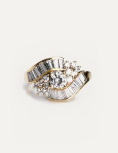 Dress ring tapered baguette and round diamond cross over 18ct yellow gold ring size N