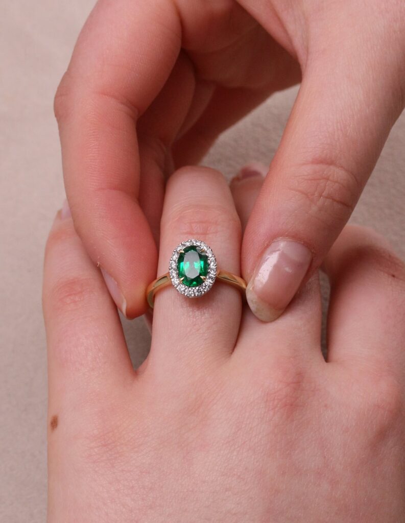 Cluster ring oval Emerald 1.18ct and diamond halo 0.29ct GIA cert 6235634413 18ct yellow gold ring size M