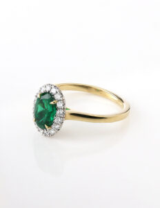 Cluster ring oval Emerald 1.18ct and diamond halo 0.29ct GIA cert 6235634413 18ct yellow gold ring size M — side view