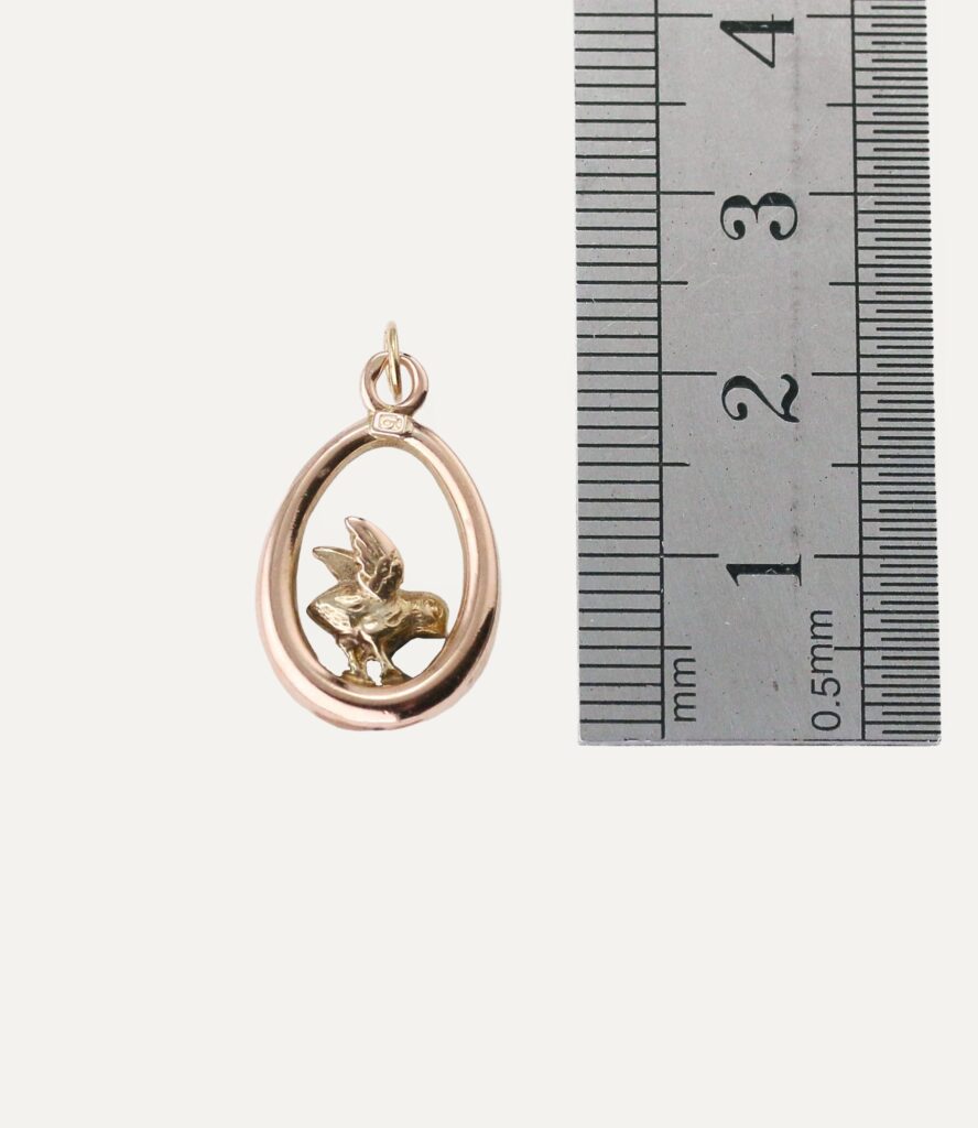 Charm little bird with ruby eye 9ct yellow gold — back view