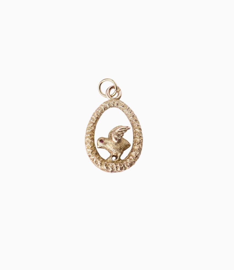 Charm little bird with ruby eye 9ct yellow gold