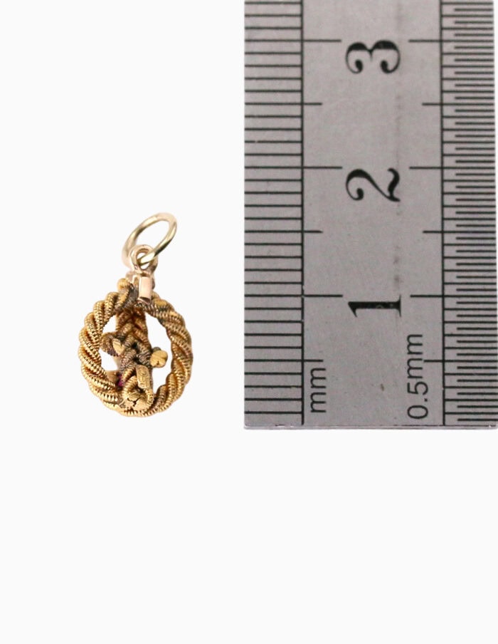Charm rope know with ruby stone 9ct yellow gold — back view
