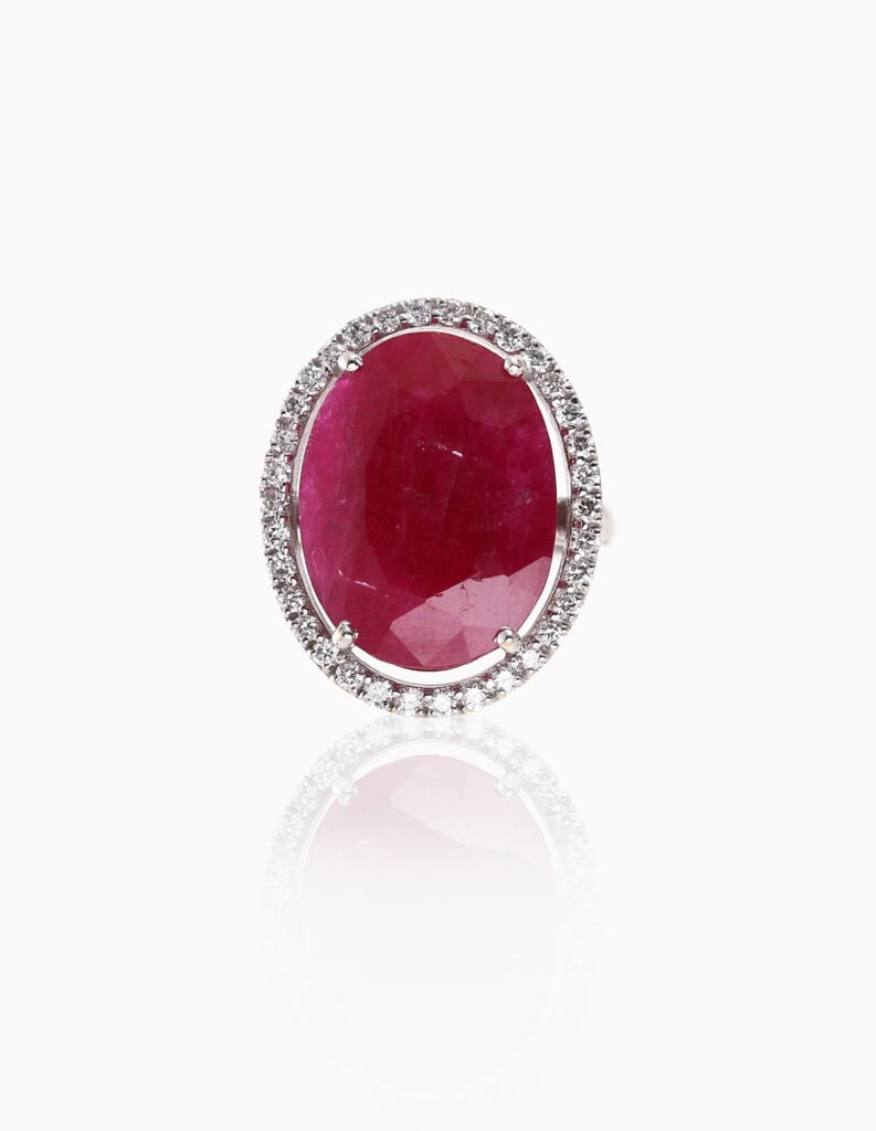 Dress ring large oval ruby with diamond halo 18ct white gold ring size O