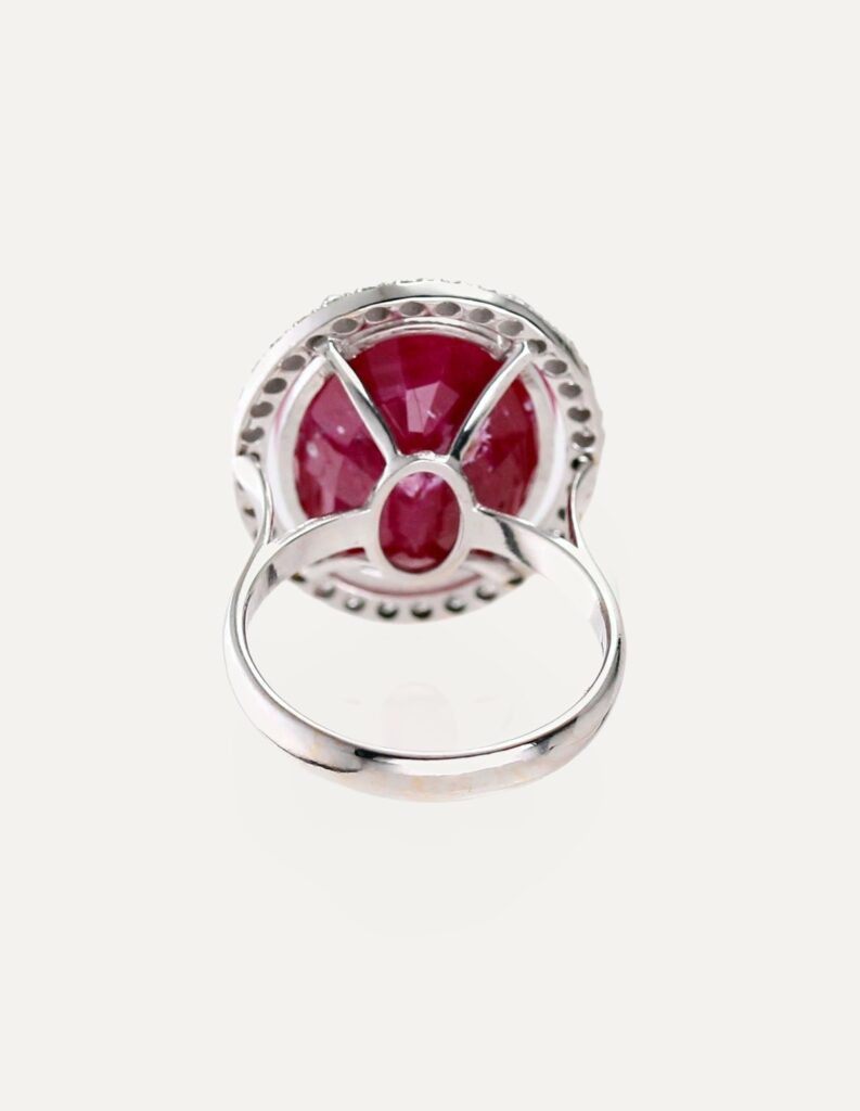 Dress ring large oval ruby with diamond halo 18ct white gold ring size O — back view
