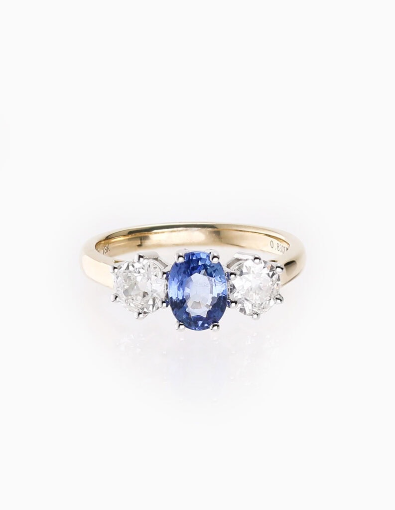 Three stone sapphire 1.23ct and old cut diamond 0.83ct ring 18ct yellow gold ring size M