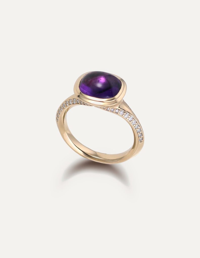 One-off 9ct gold ring with a cushion amethyst cabochon and grain-set diamond shoulders