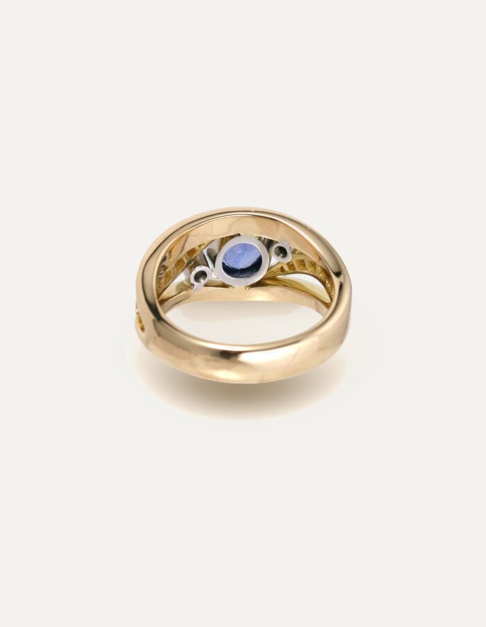 One-off 9ct yellow gold ring with a cushion sapphire and diamond-set shoulders
