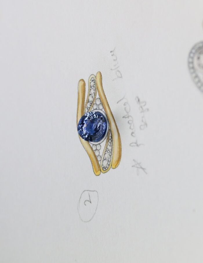 One-off 9ct yellow gold ring with a cushion sapphire and diamond-set shoulders