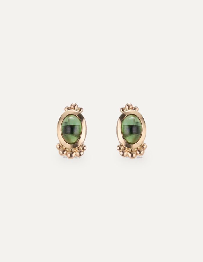 One-off green tourmaline cabochon stud earrings in 9ct yellow gold with bead-set bezels