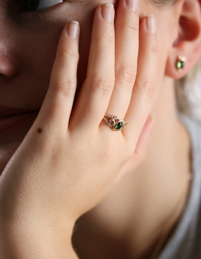 One-off 9ct gold swirl ring with a green tourmaline cabochon and applied gold beads