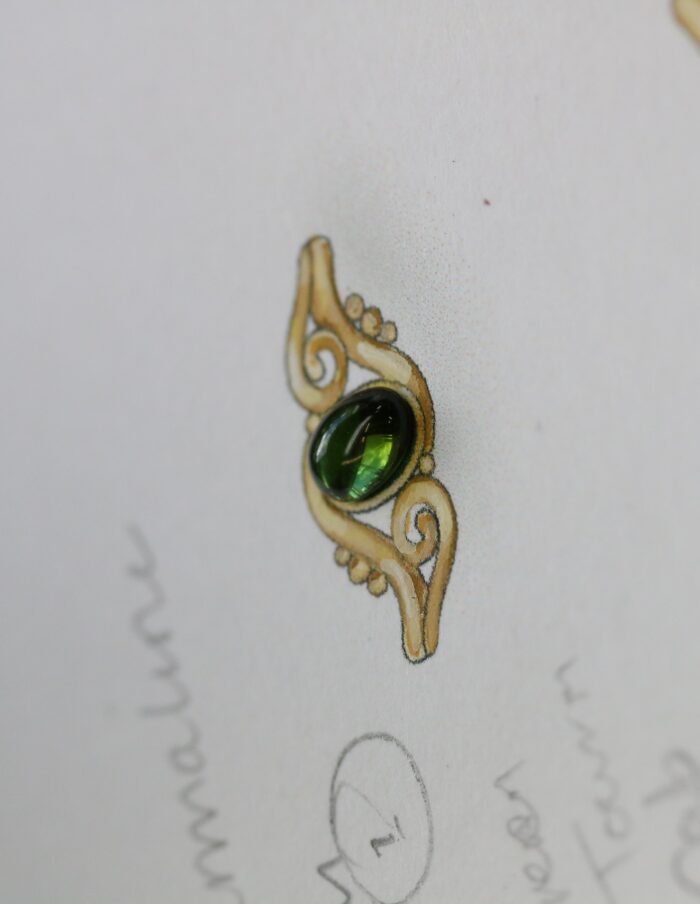 One-off 9ct gold swirl ring with a green tourmaline cabochon and applied gold beads